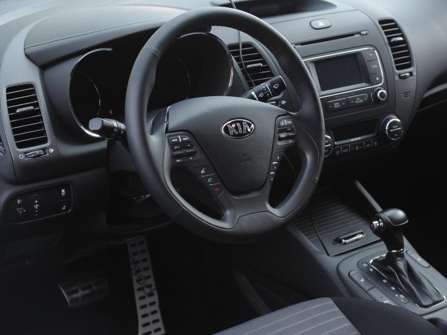  Kia Cerato Koup 2013 года  (фото 2 из 26)